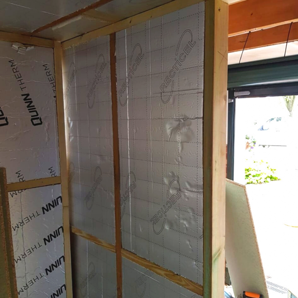 Timber stud partitioning with added insulation